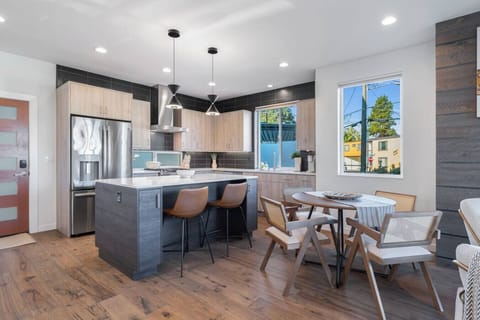 Comfortable seating for six keeps meals easy, whether you cook in or bring back local favorites.