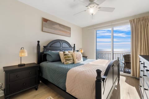 Master bedroom #1 with king bed off of living room