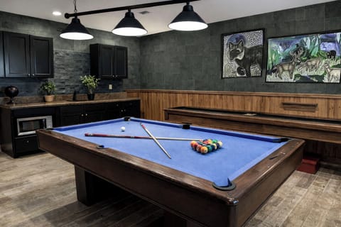 Play pool and shuffleboard in the recreation/game room