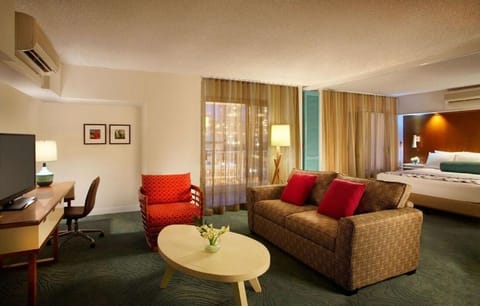 Settle into your spacious suite with lounge and sleep zones.