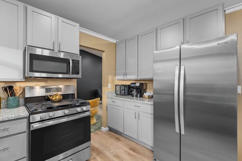 Kitchen full equipped with modern appliances