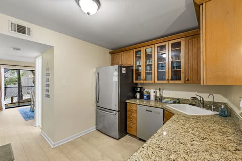 Bright kitchen with stainless steel appliances