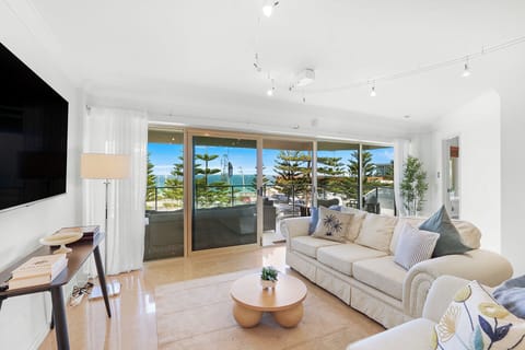 Comfortable living space framed by beautiful outdoor views