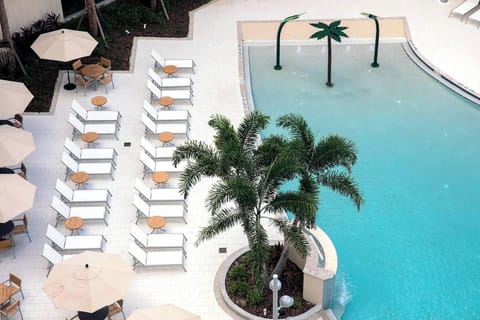 Claim a lounger and unwind by the sparkling water.