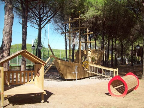 Playground, Public Space, Outdoor Play Equipment, Tree, Human Settlement, Swing, City, Play, Recreation, Room