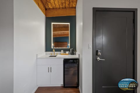 Enjoy your spacious room with 2 queen beds, smart TV, dressing area, mini frig. Entrance to room