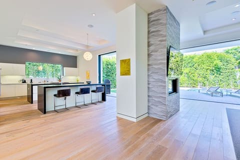 Sleek, modern kitchen with spacious countertops, fully equipped for daily cooking or entertaining