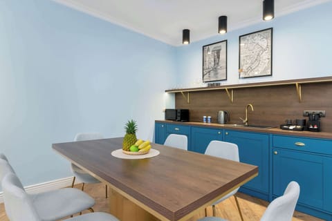 Dining area connected to kitchen space.
