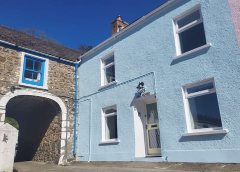 Enter the historic Mill complex through the arch to the courtyard and parking