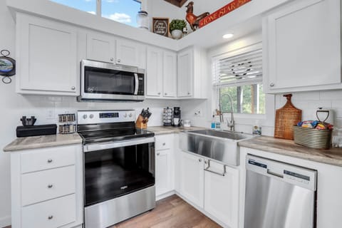 The kitchen features modern appliances