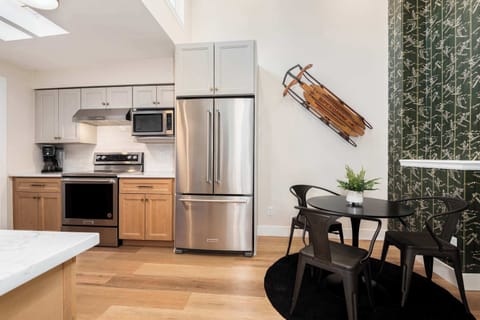 Easy access between kitchen and dining for seamless entertaining.