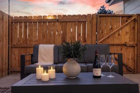 Enjoy drinks and meals outside in a private, fenced setting.