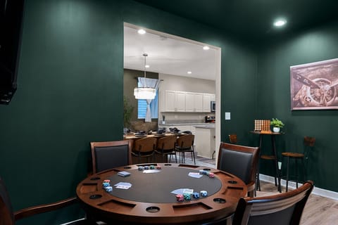 Private Gaming Den: Retreat to this moody, stylish space featuring a card table for a fun night of competition with your group.