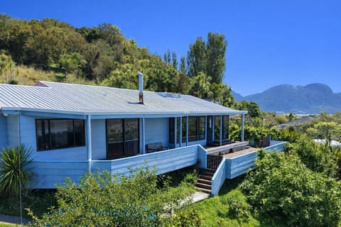 House with mountains