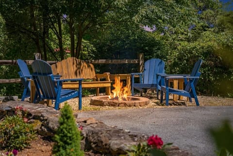 Front Yard | Fire Pit | Blue Chairs & Wooden Bench