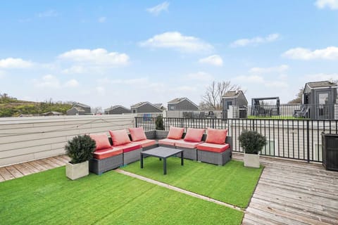 Rooftop patio with grill, corn hole, and views perfect for lounging