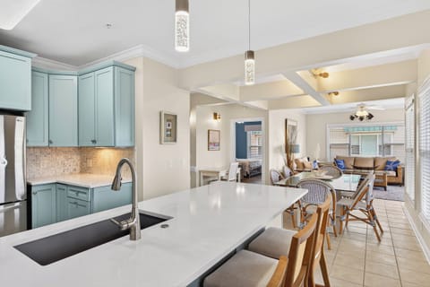 Open layout keeps everyone connected from living room to kitchen.