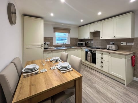 Kitchen/diner | Taigh-Beag - High Vennel Cottages, Wigtown, near Newton Stewart
