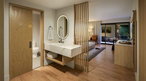 Imagine arriving to a spacious suite with calming, clean lines.