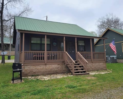 Cabin #7 with grill ~ front door view