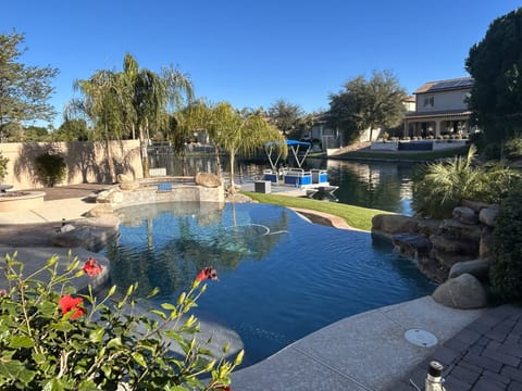 Infinity play pool with  spa and waterfall.
