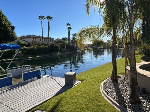 Private dock, pontoon, and river view.