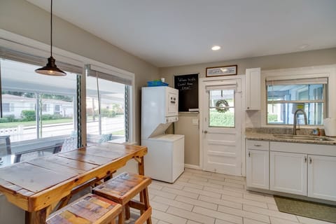 Full kitchen, BBQ tools, blender, coffee maker, dishes, toaster, washer & dryer.