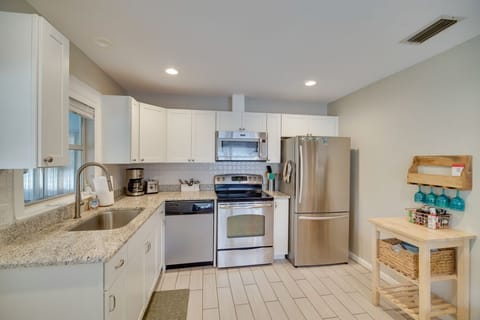 Full kitchen, BBQ tools, blender, coffee maker, dishes, toaster, washer & dryer.