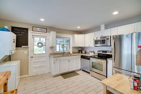 Full kitchen, BBQ tools, blender, coffee maker, dishes, toaster, washer & dryer.