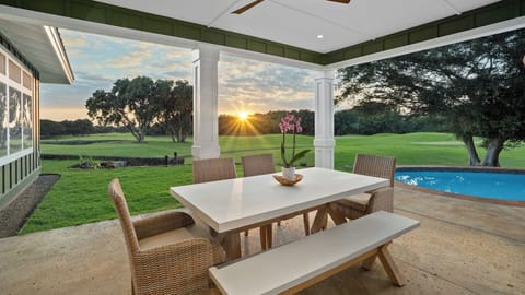 Savor sunset dinners at your private covered dining space, overlooking the golf course with pool views for perfect evenings.
