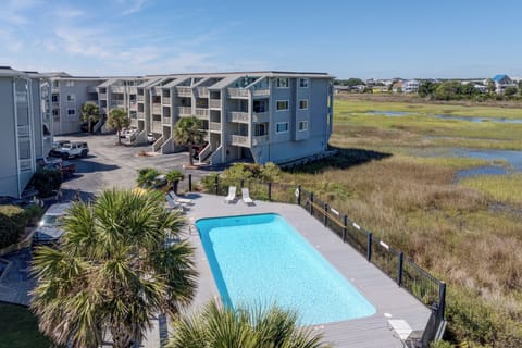 Private pool overlooks salt marsh