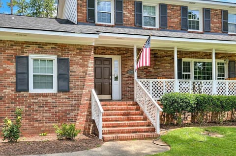 Step into comfort – a welcoming front porch that beckons you to pause and enjoy the morning sun.
