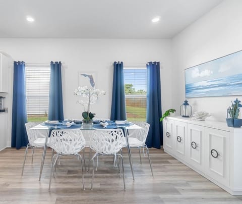 Enjoy elegant dining setting for 6 (additional seating is available at the island with 4 barstools). Enjoy extra placemats, table cloth, board games stored in the sideboard. Dining table is made of tempered glass.