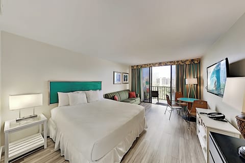 Updated flooring in studio with king bed, queen sofa sleeper, dinette and  
private lanai