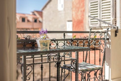 Balcony with sitting area.