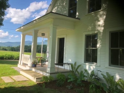 Front Porch Details

“Inviting front porch with seating — a perfect place to unwind and take in the scenery.”