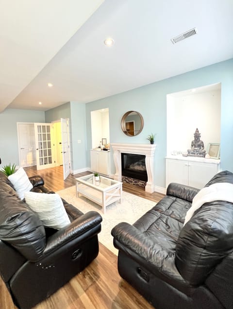 Cozy livingroom with Gas Fireplace and a cupboard full of board games!
