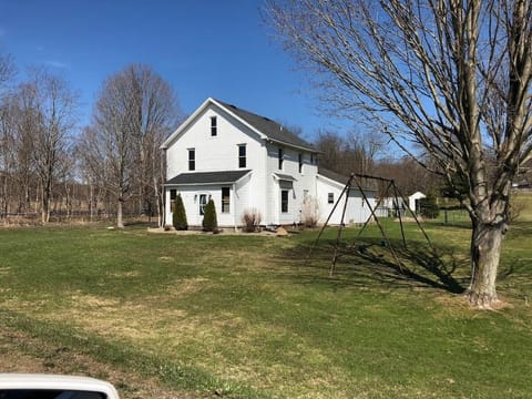 The welcoming exterior of Meadow View sits on 1.5 open acres, offering a peaceful countryside setting with plenty of space to relax, play, and enjoy the fresh Chautauqua County air