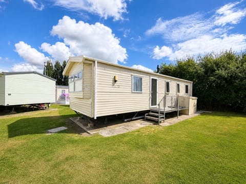 Enjoy a stay in this beautiful caravan which sleeps up to 6 people. The open plan living is perfect for relaxing all together on your break.