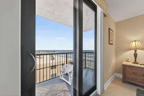 Panoramic beach views right from the bedroom.
