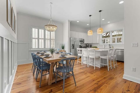 Seating for eight at this lovely dining space for the family with additional seating for five at the kitchen counter