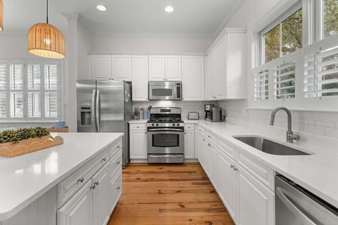 Kitchen is stocked with all you need to cook your gourmet meals. The kitchen with stainless steel appliances.
