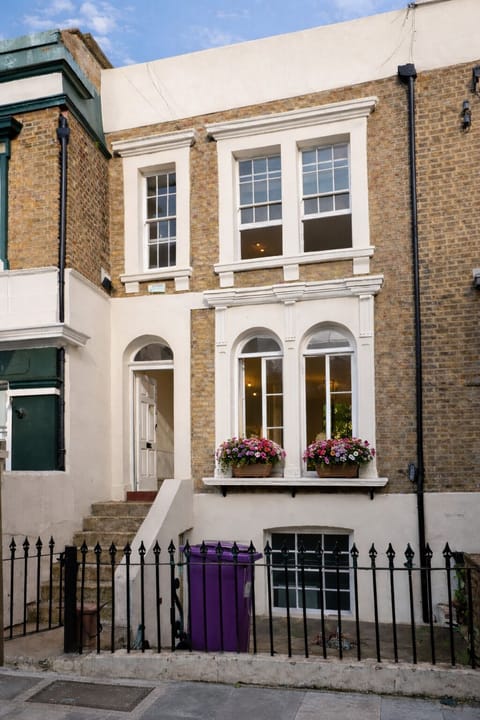 The charming exterior of our traditional Victoria terrace house.