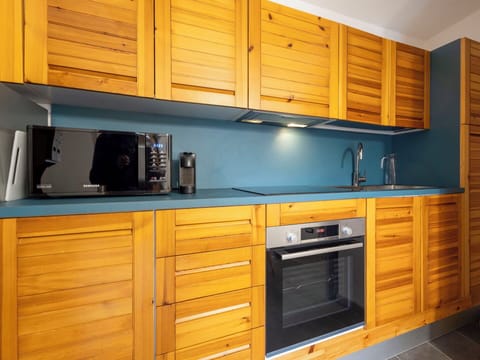 Cabinetry, Wood, Flooring, Furniture, Interior Design, Cupboard, Drawer, Floor, Countertop, Kitchen