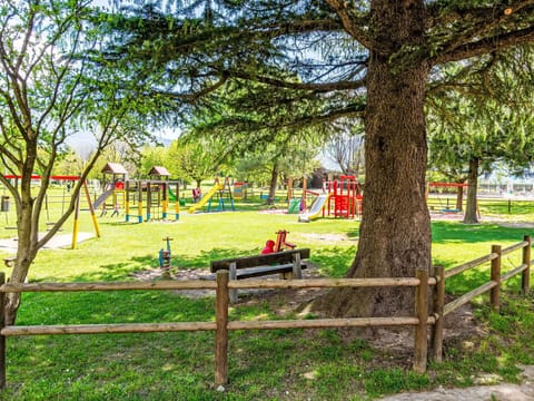 Public Space, Outdoor Play Equipment, Playground Slide, Park, Recreation, Lawn, Shade, Garden, Leisure, Playground