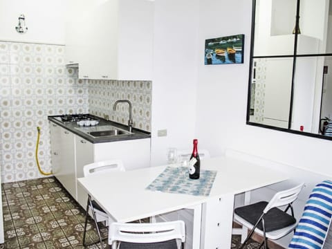 Furniture, Flooring, Interior Design, Floor, Kitchen, Major Appliance, Kitchen Appliance, Room, Chair, Countertop