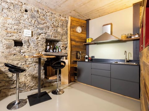 Furniture, Flooring, Interior Design, Countertop, Wood, Kitchen, Ceiling, Floor, Cabinetry, Lighting