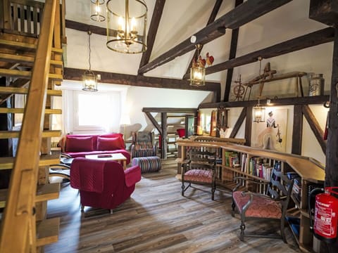 Wood, Flooring, Interior Design, Furniture, Ceiling, Floor, Wood Flooring, Lighting, Room, Living Room