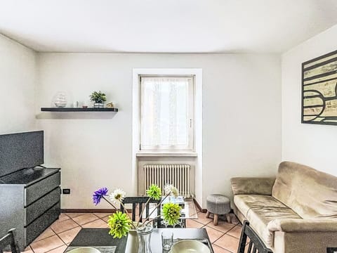 Furniture, Interior Design, Flooring, Couch, Floor, Room, Living Room, Apartment, Picture Frame, Lighting