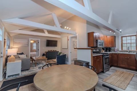 Open concept living room, dining room, and kitchen